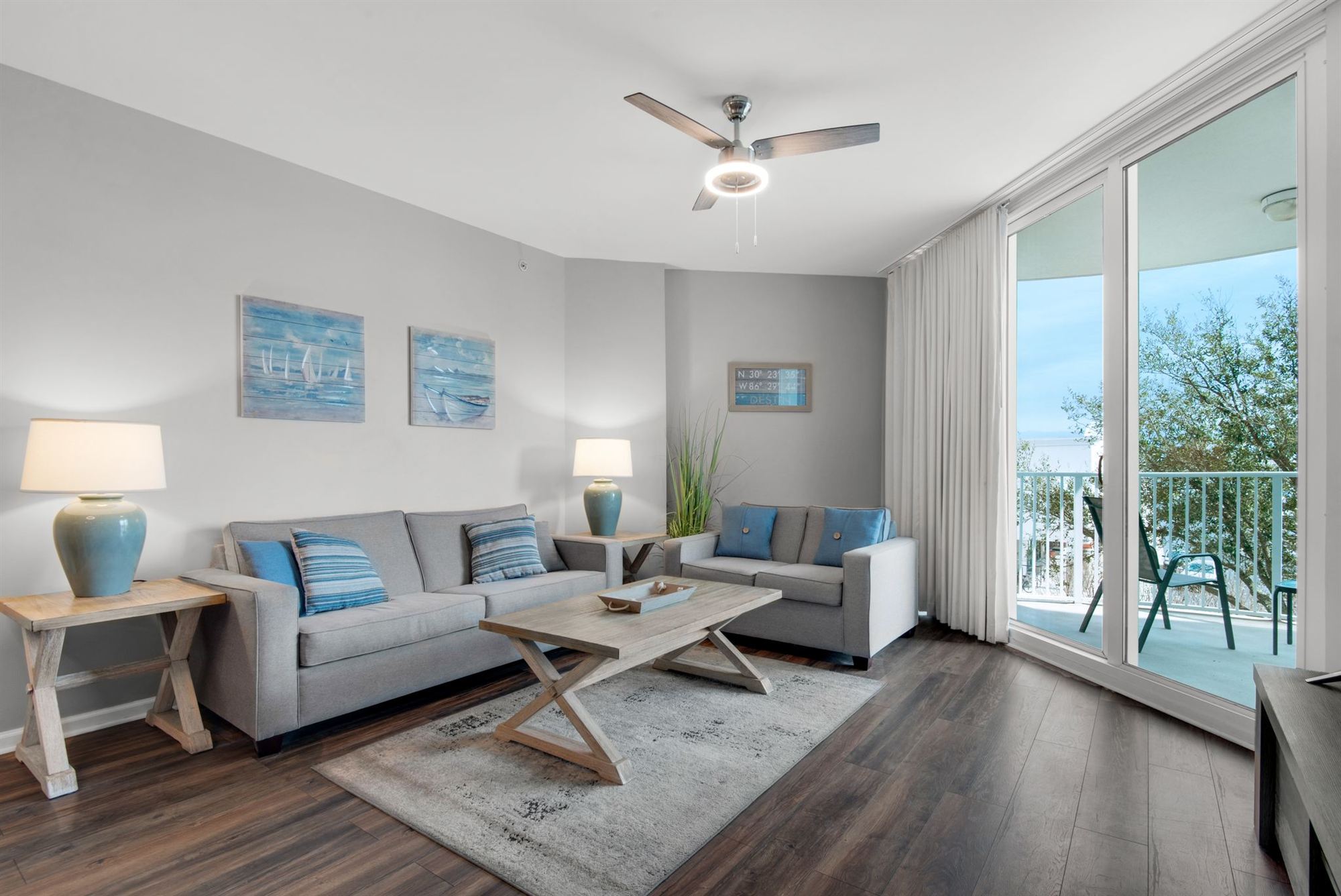 Bright living room with Gulf view at The Palms of Destin